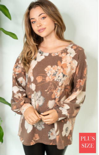 101 long sleeve floral print knit top with a round neck featuring a bishop sleeve and a relaxed fit. Fabric is a soft fleece-like material. T22502A29