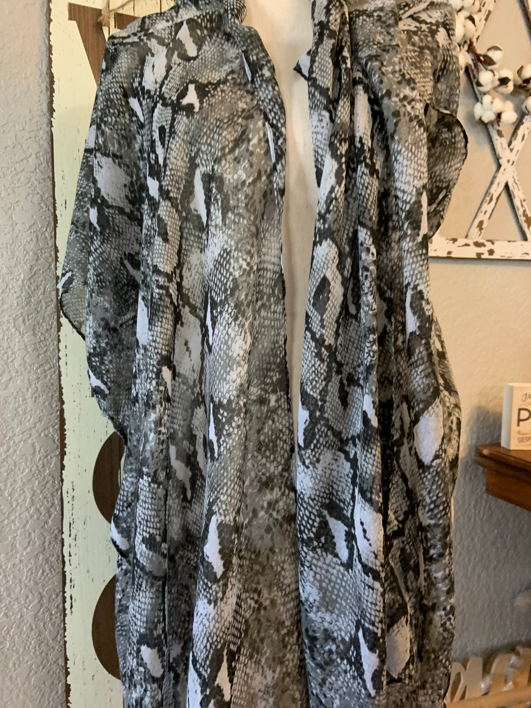 Snakeskin kimono with tassels