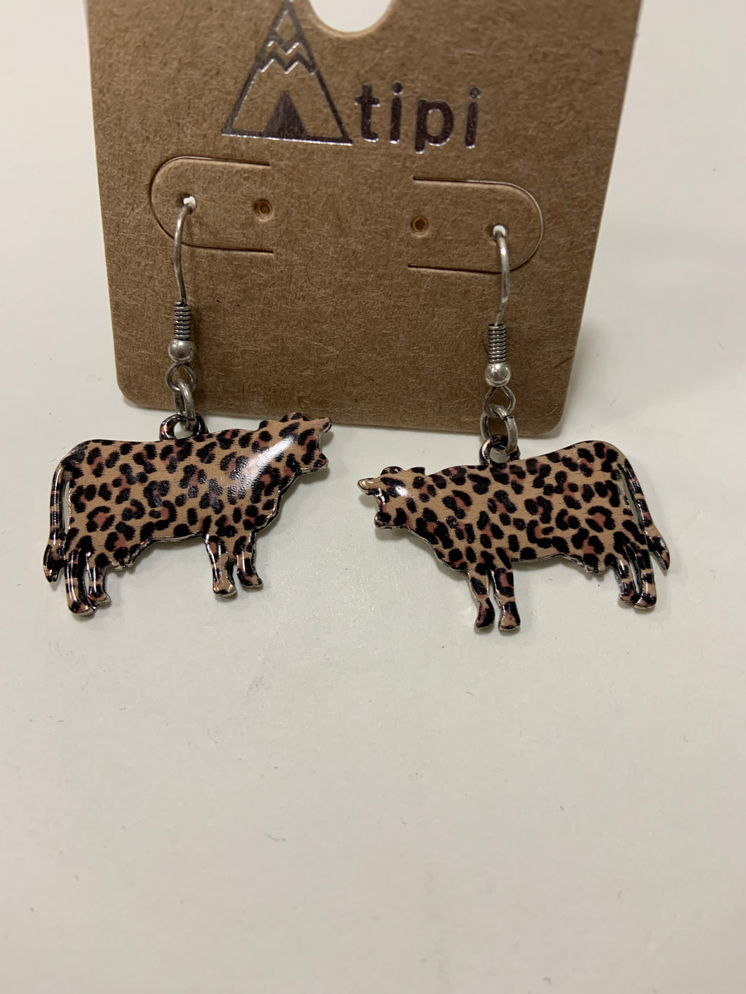Cheetah cow earrings