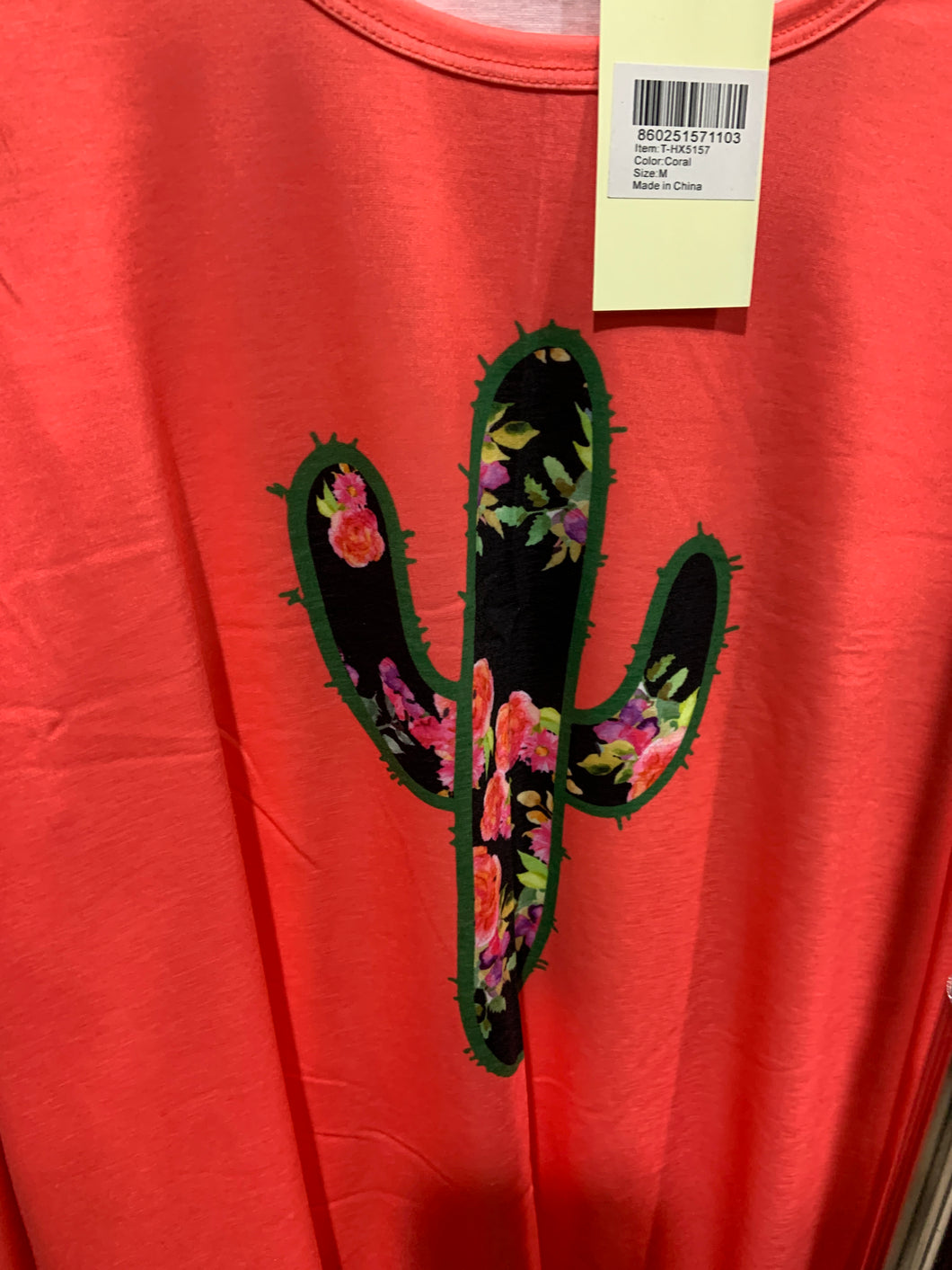 Coral with cactus top