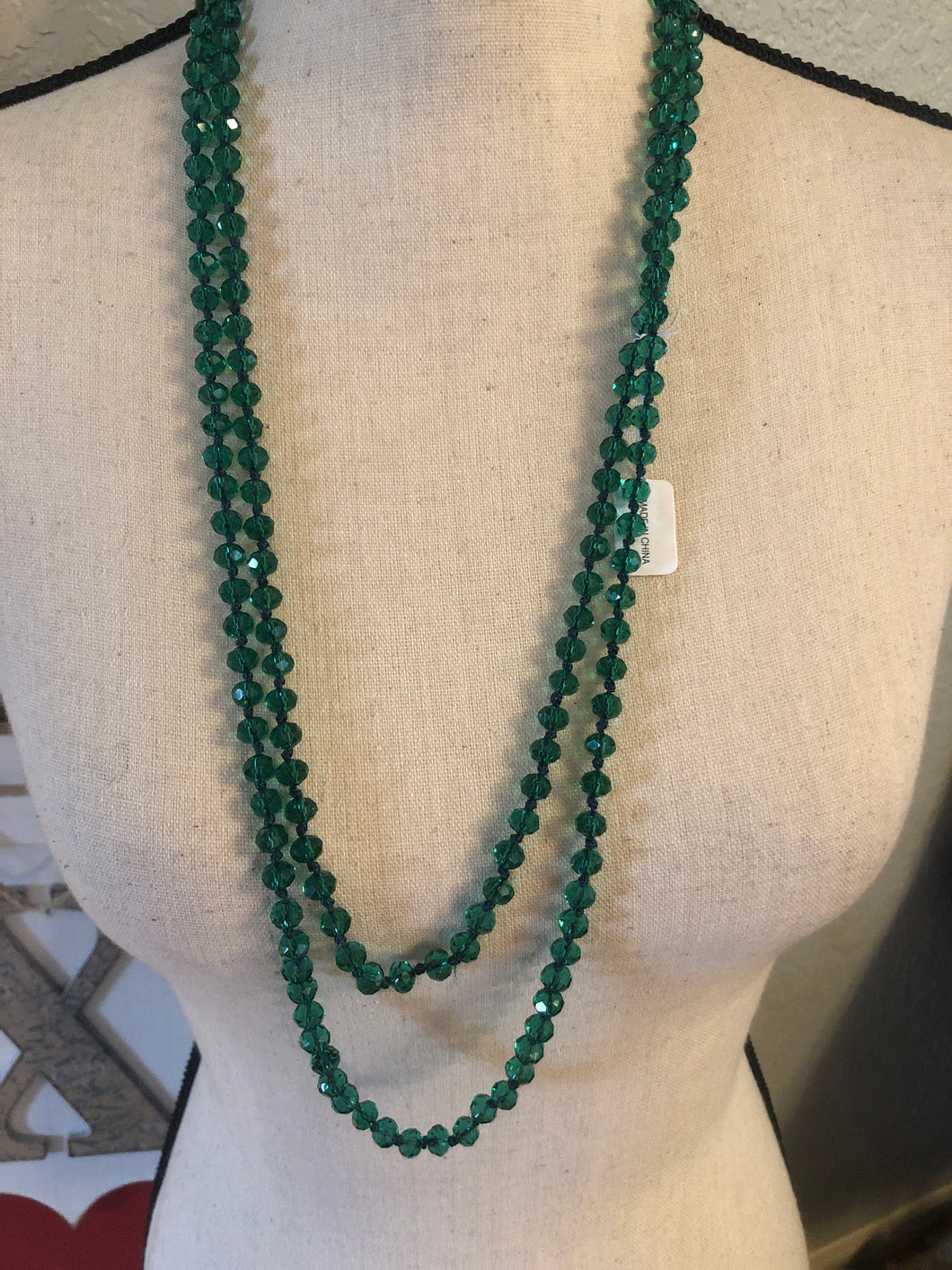 Green lucent beads