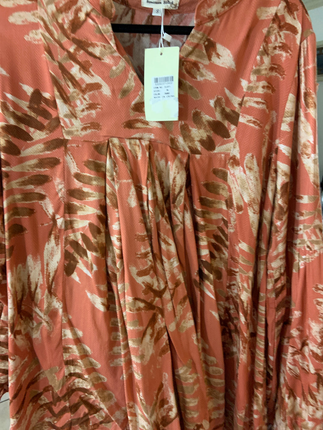 Tangerine and feather top