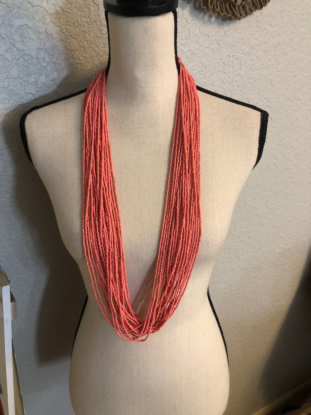 Long corral beaded necklace