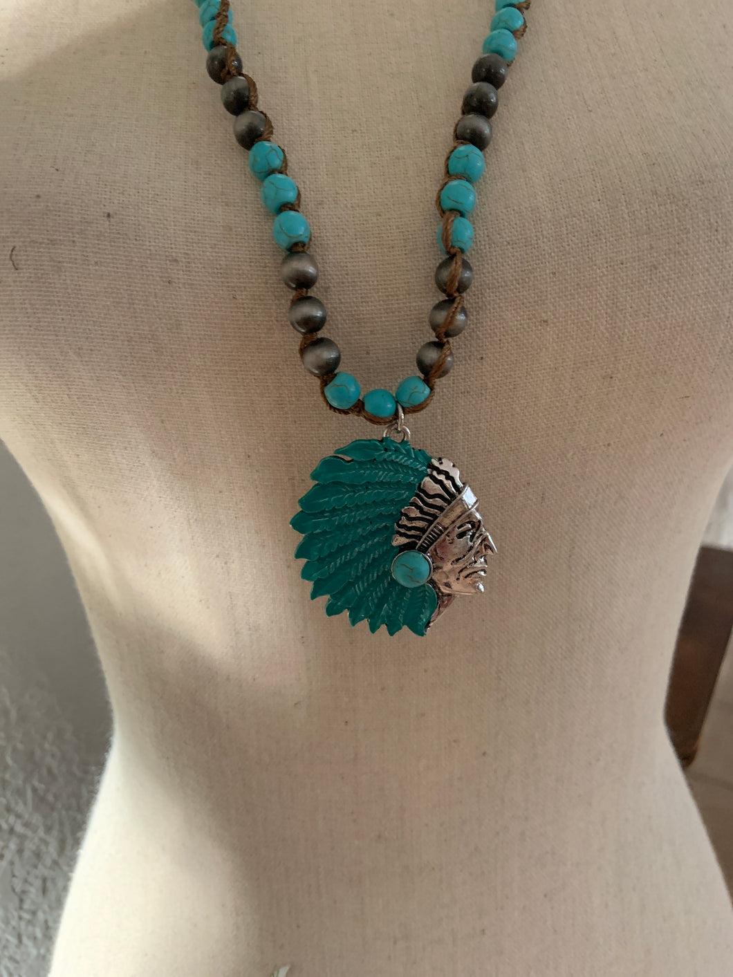 Indian head and necklace
