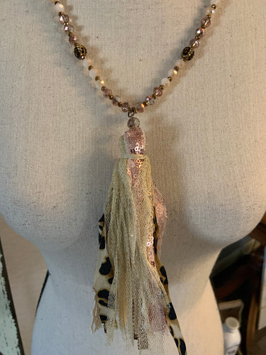 Gold cheetah with cheetah ball tassel necklace