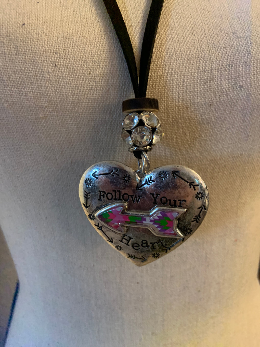 Hammered metal follow your heart necklace