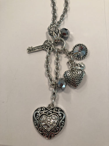 Long heart charm necklace