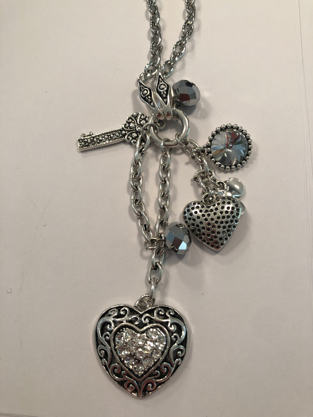 Long heart charm necklace