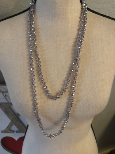 Clear/silver on pink cord beads