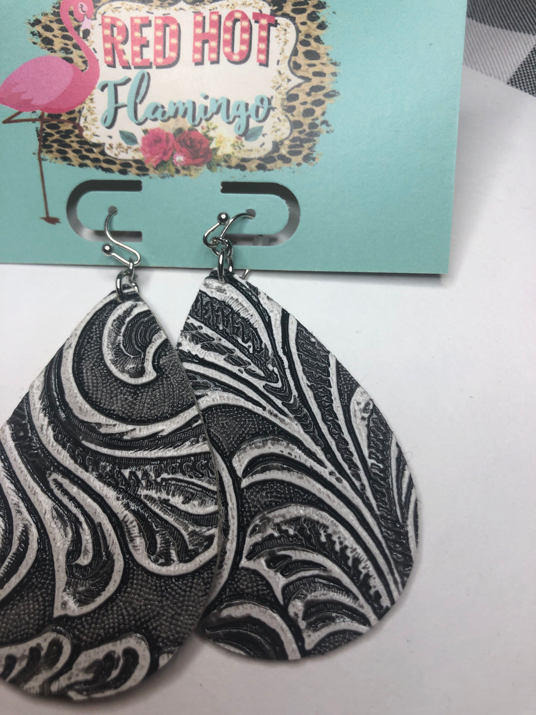 Black/white tooled teardrop earrings