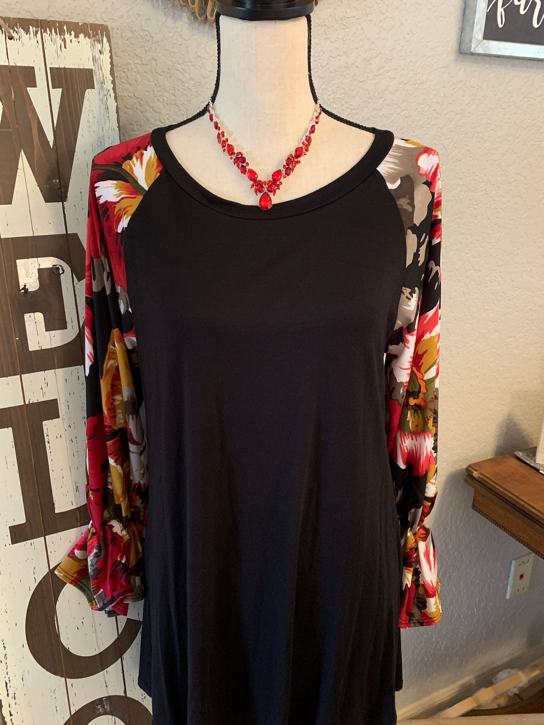 Top with gorgeous floral sleeves