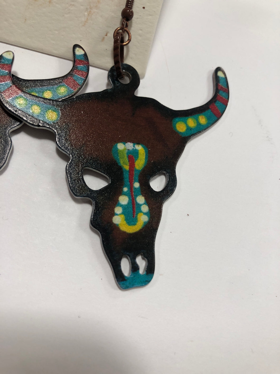 Metal bull skull earrings