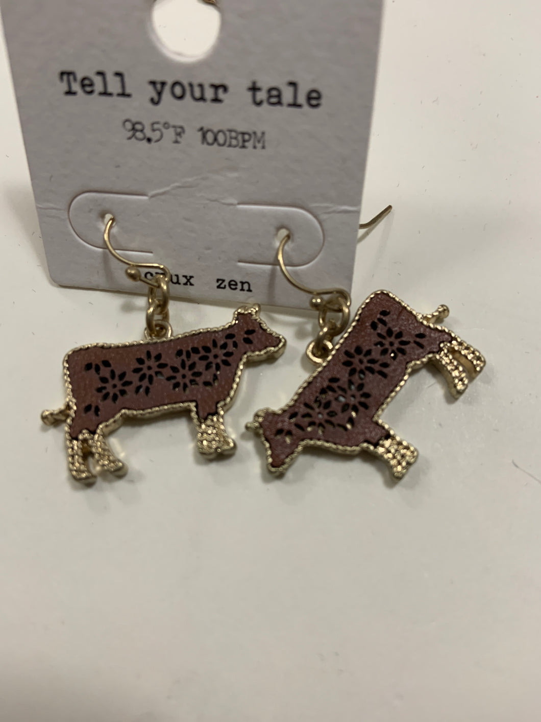Brown cow earrings