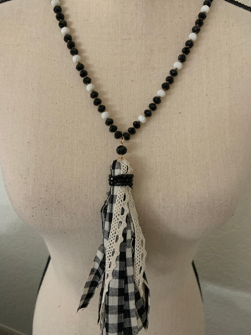 Black and white plaid beaded tassel