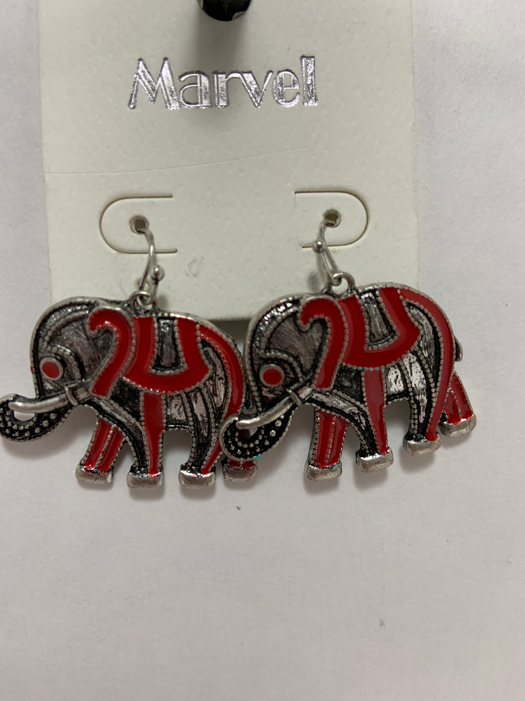Elephants with red and silver earrings