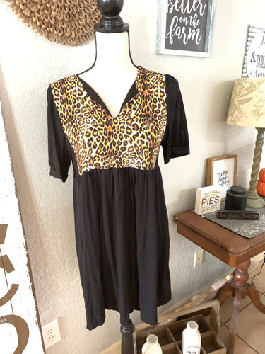 Top great stretch animal print with black rayon bodice