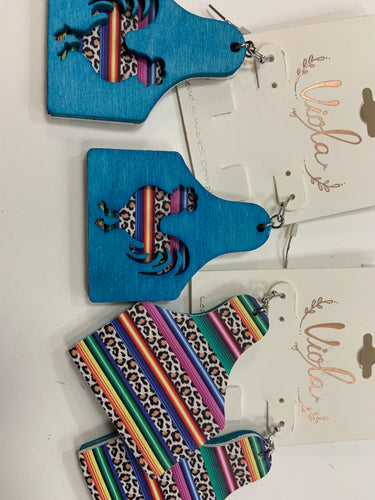 Tag earrings with cut out rooster and serape back