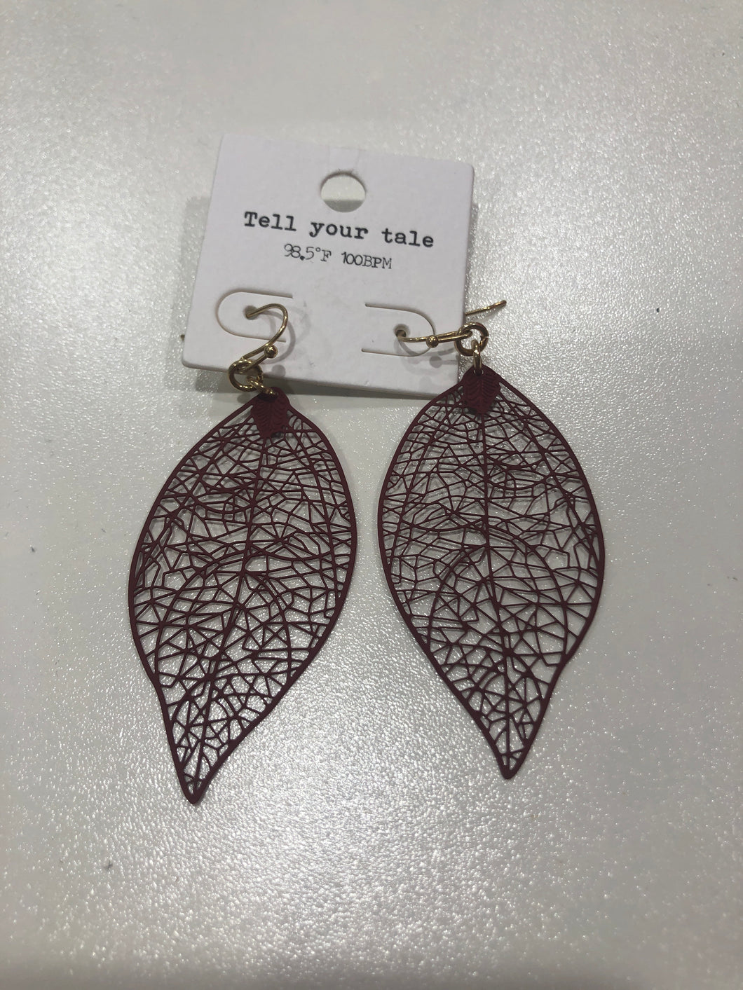 Earrings brownish red