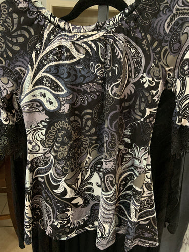 Kids address crocheted sleeve black background Paisley