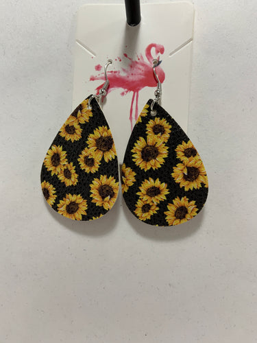 Sunflower earrings with black background