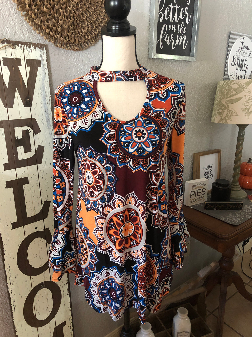 Top long sleeve ruffle, burgundy background