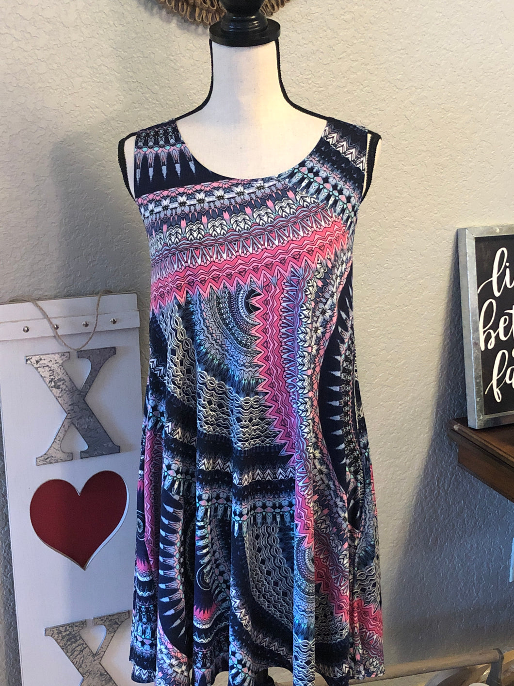 Navy background with pinks and mint tank dress