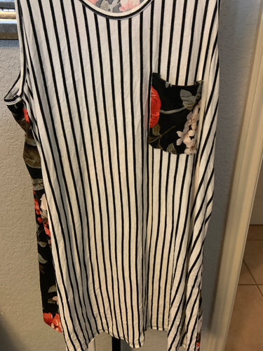 Party tank top floor in the back striped in the front