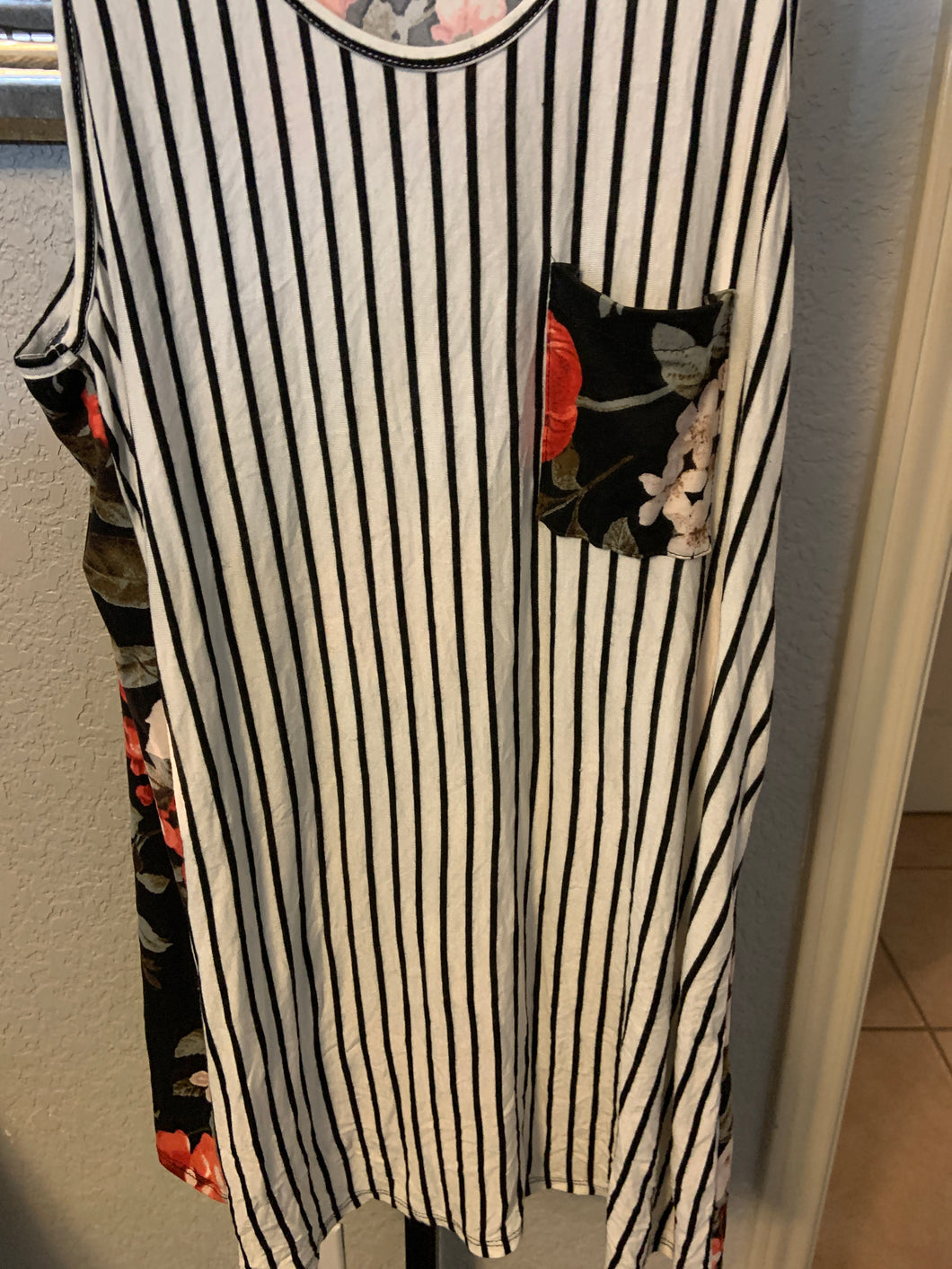 Party tank top floor in the back striped in the front