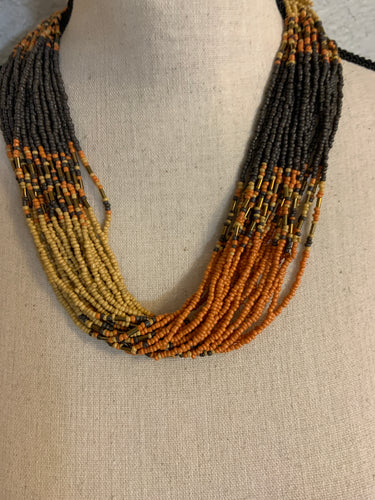 Sea bead necklace orange mustard and gray