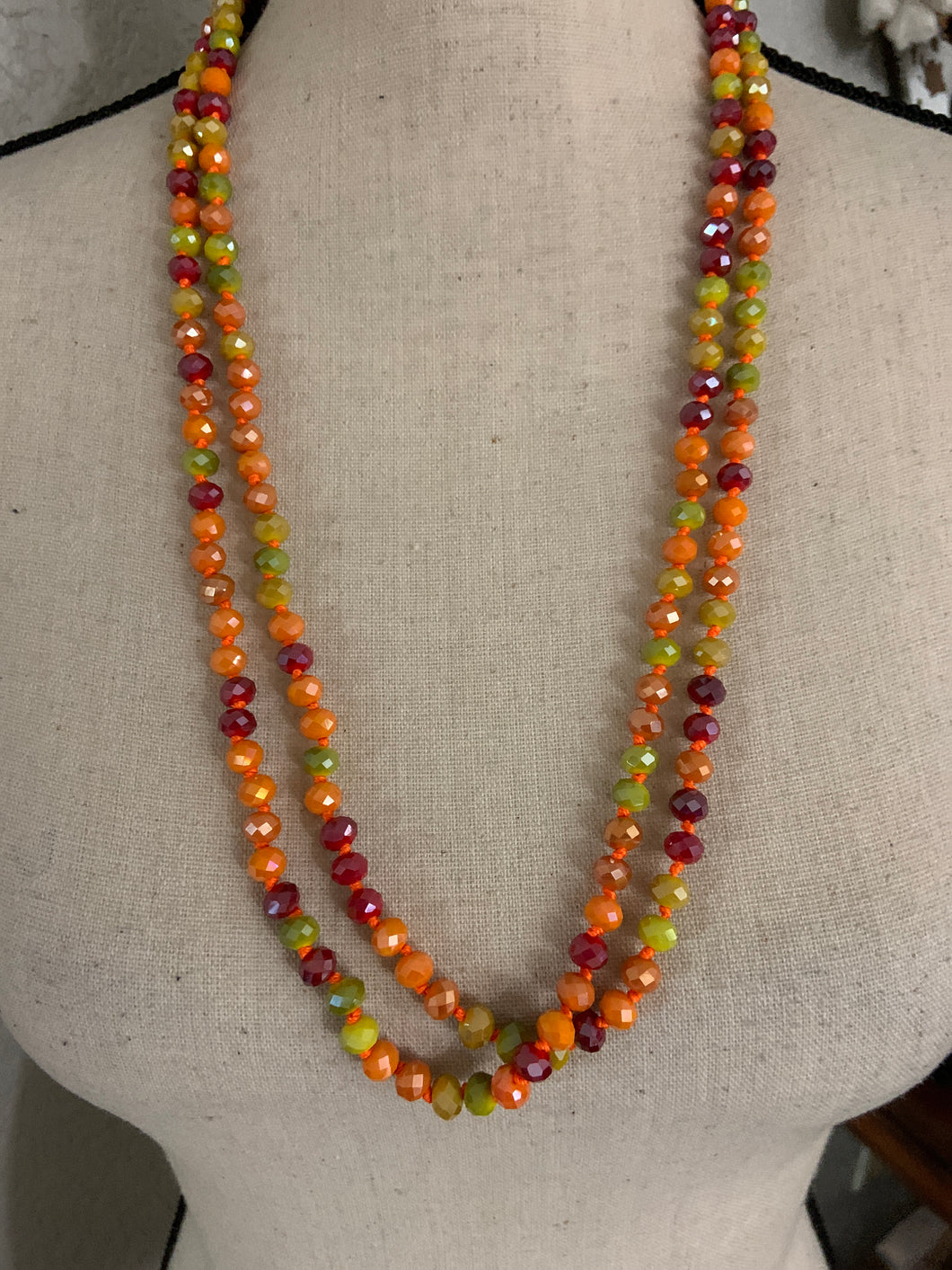 Multicolored beads green orange red