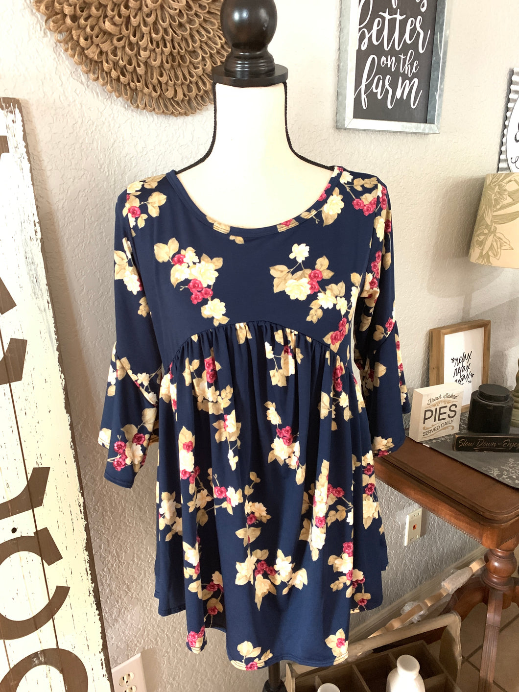 Top navy background with floral