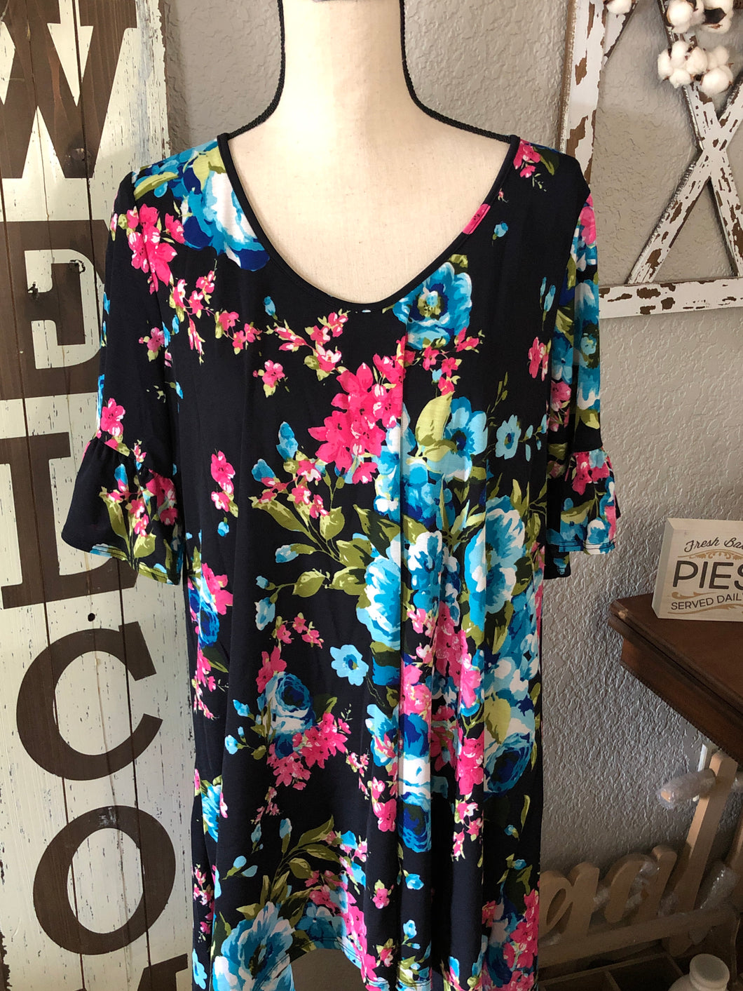 Navy floral flow top