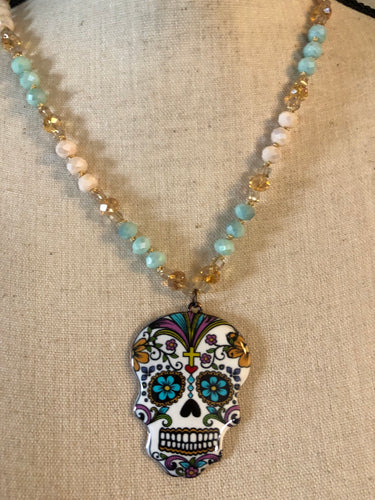 Metal sugar skull necklace with mint and cream bead
