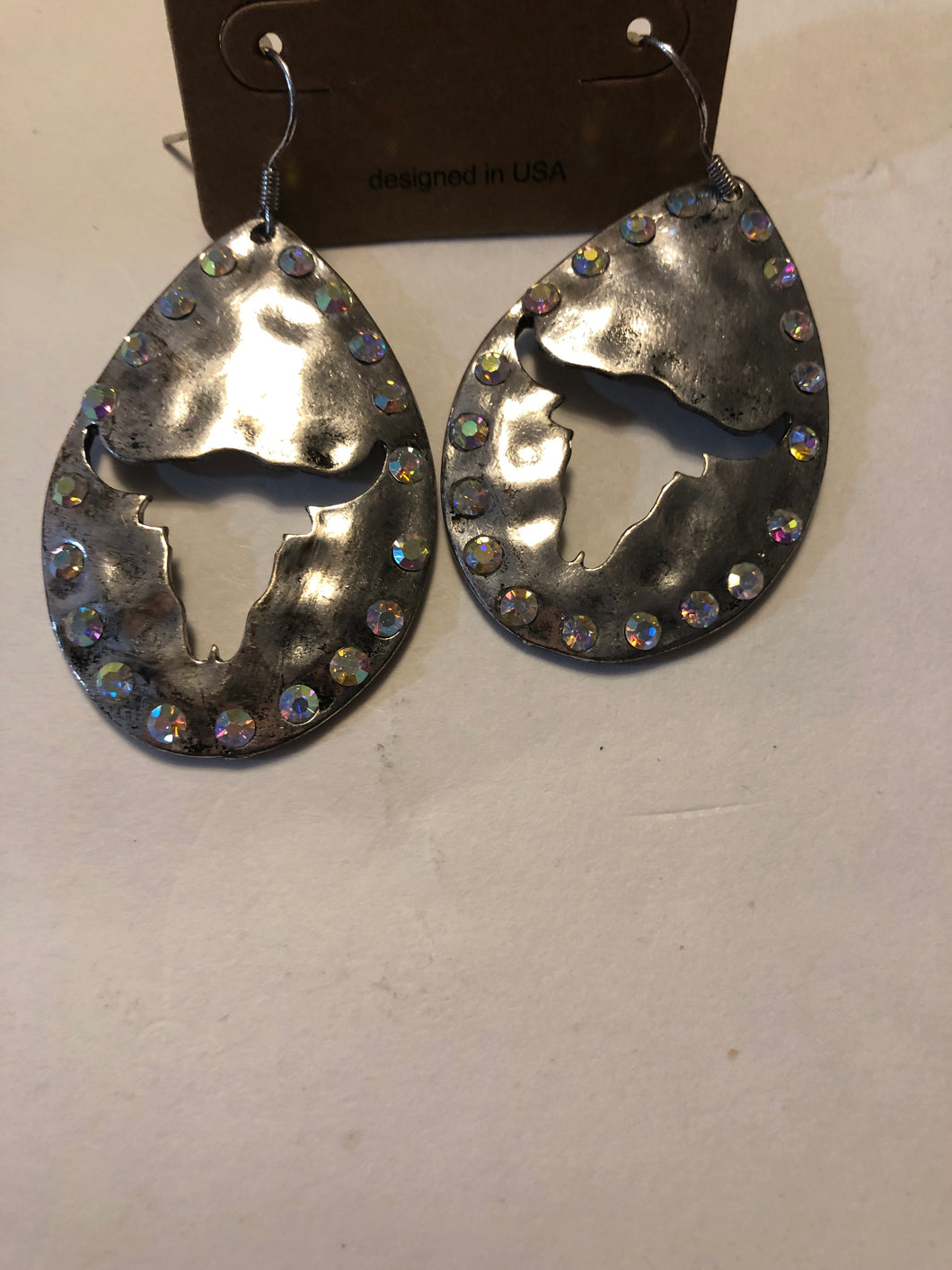 Hammered metal bull earrings
