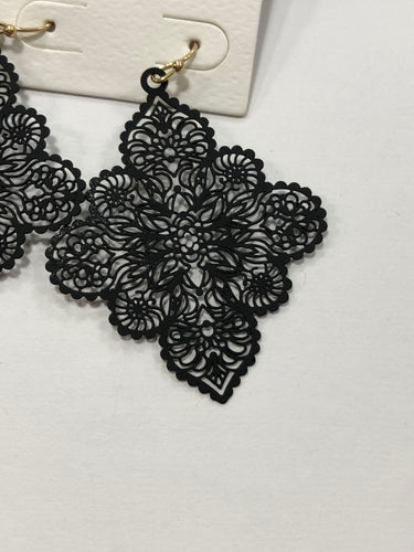 Black ornate earrings