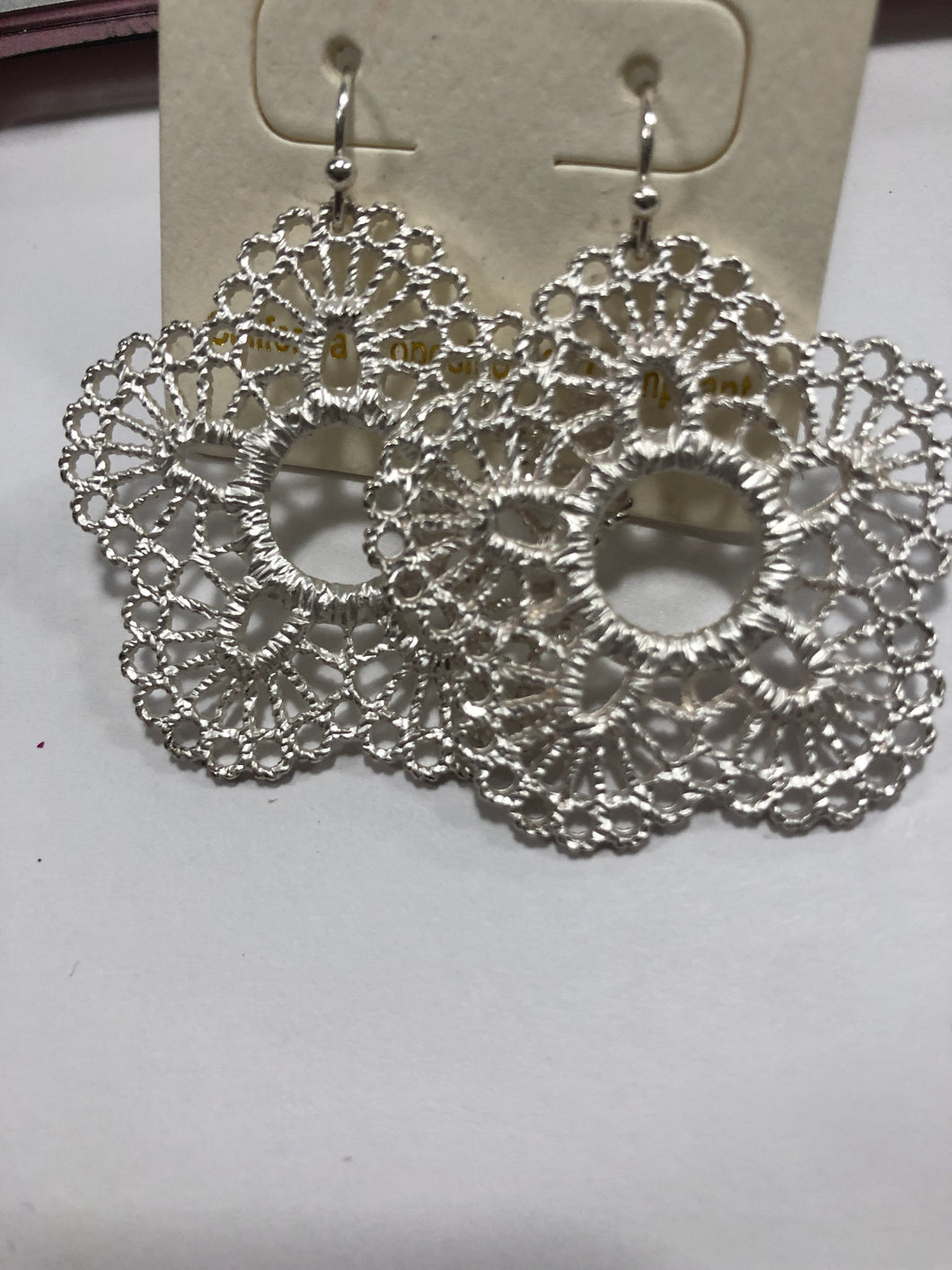 Brushed silver medallion earrings