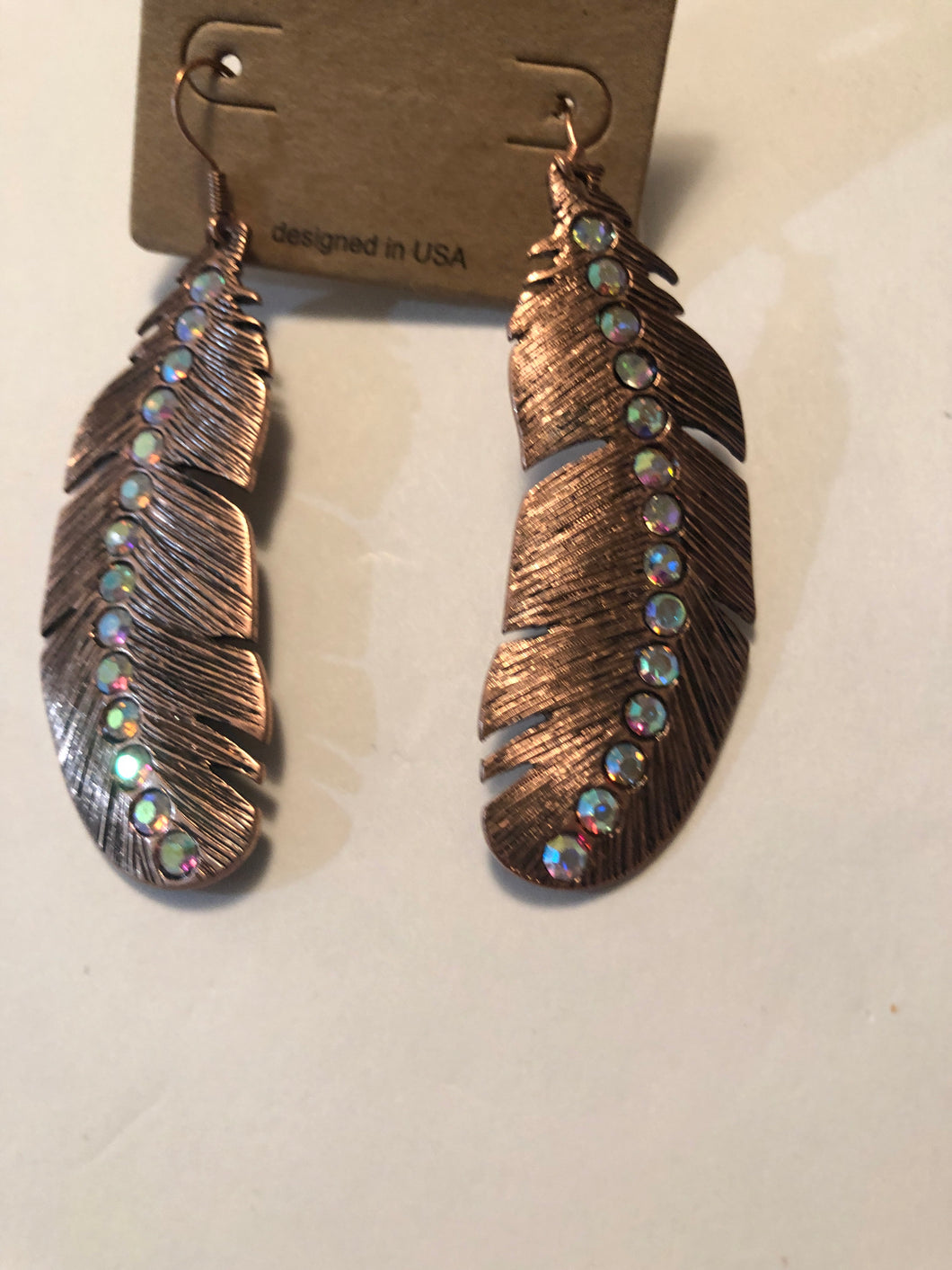 Earrings copper feather