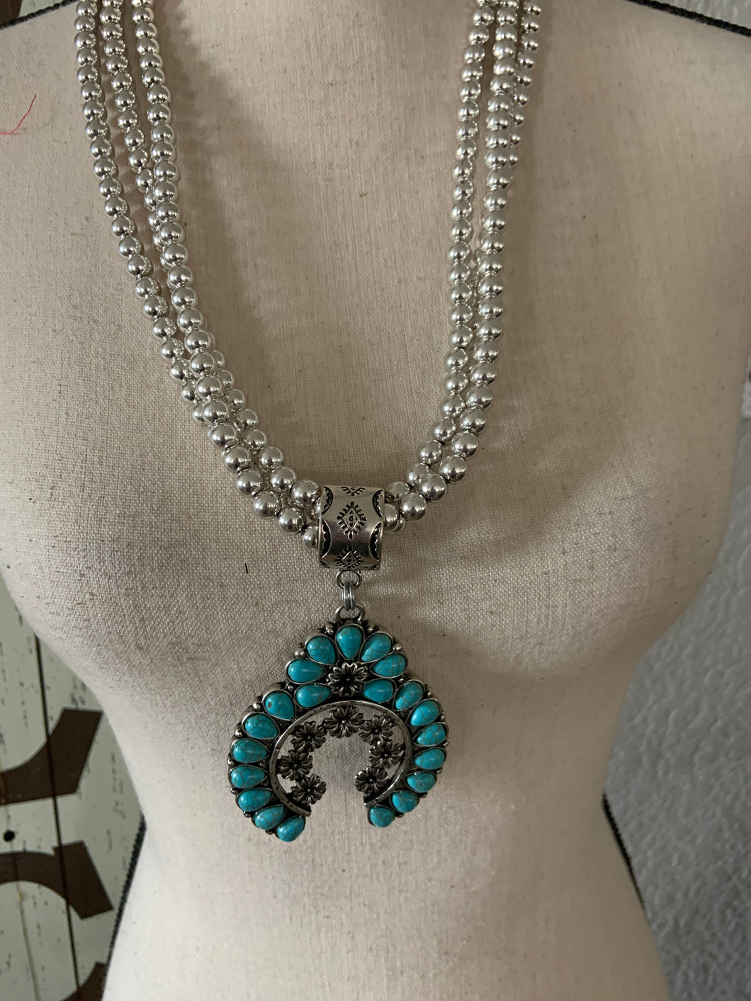 Squash blossom turquoise necklace