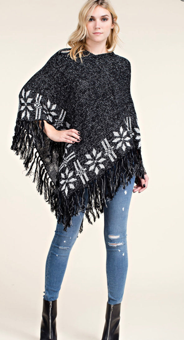 Sweater poncho with fringe